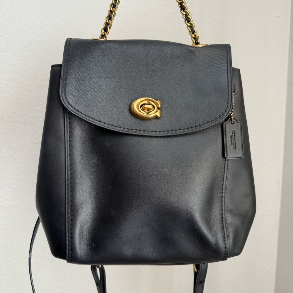 Coach Black Leather Backpack with Gold Accents